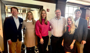 The team at Moore Invested celebrates their anniversary