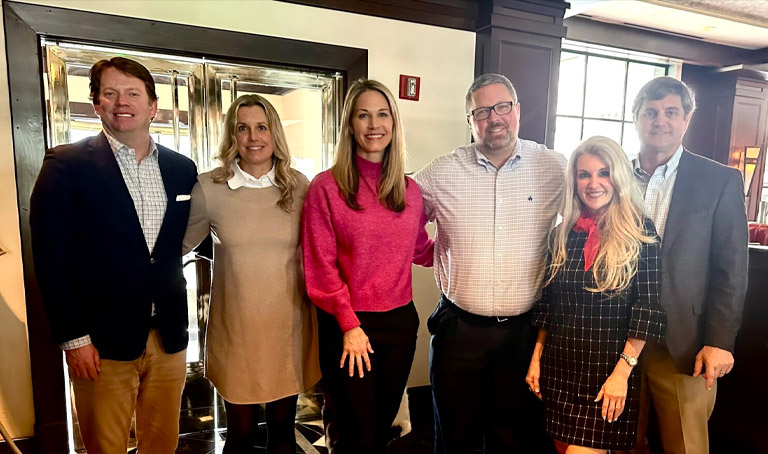 The team at Moore Invested celebrates their anniversary