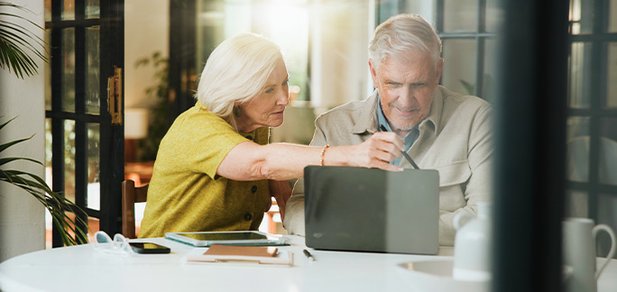 retired couple saving investments