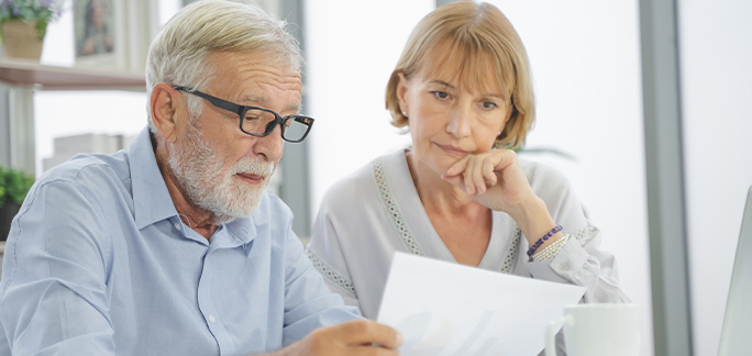 retired couple reviewing their plan
